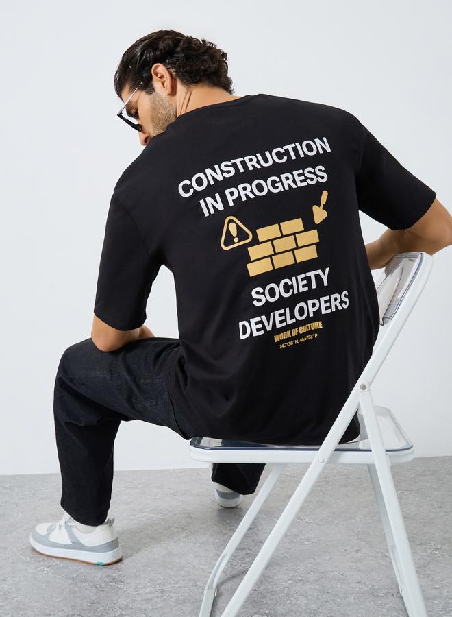 Styli Men Black Slogan Print Oversized T-Shirt - Image 1